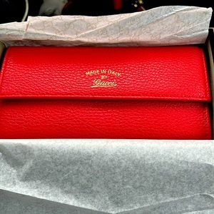 Brand New Authentic Red Gucci Wallet. $375.00 serious inquiries only please.